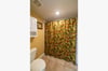 Main bathroom offer shower & tub combo