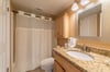 The tropical inspired bathroom has a tub/shower combo, toilet and single vanity. High end maple cabinetry and granite with updated lighting and mirrors! The bathroom has a shower massage and a hair dryer for your convenience.