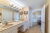 The Main Suite master bath has a separate dressing area with double vanity and a huge walk in closet.