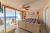 Beachfront master bedroom provides a king sized bed