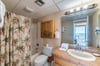 Master en-suite master bath provides a tub/shower combo and single vanity