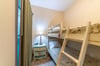 Ahhh! The Crew's Quarters Bunk Room is every kid's dream! Decorated just for the kiddos!