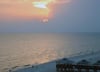 Capture fantastic sunsets over Pineapple Willy's Beach Deck
