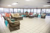 The community center has ample seating for everyone with a large flat screen TV, kitchen, bathrooms, and ping pong table