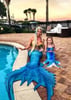 The mermaids hang out at Sisters of the Sea.