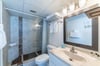 The master bath provides a walk-in shower and single vanity