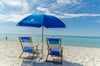 Rent beach chairs/umbrellas from beach service