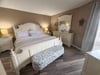You'll love your Coastal Shells main bedroom with a king sized bed with high thread count linens