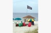 Rent beach chairs/umbrellas from Beach Services