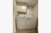 Your full sized washer and dryer are located in the kitchen for your convenience