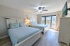 The Ocean Breeze Second Bedroom Suite offers two queen sized beds with high thread count linens