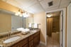 The Main Suite Bath has a separate dressing area and features an over sized soaking tub.