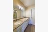 Beautiful granite and high end cabinetry. The main bath has a large walk-in closet as well