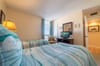 The Blue Waves bedroom offers a flat screen TV with Roku streaming and access to the en-suite guest bathroom