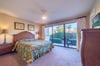 The Tropical Dreams Third Bedroom Suite offers a queen sized bed with luxurious linens and it's very own private patio