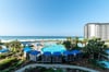 Large private balcony that looks over the lagoon pool, splash pad, and beach!