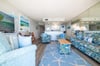 You'll love this beach themed great room with a queen sleeper sofa, coordinating chairs and your dinette set.