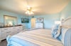 Cottage Cove Beachfront Main bedroom offers a king sized bed