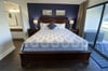 The Ocean Dream main bedroom offers a king sized bed with high thread count linens