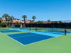 Multiple tennis courts on site.