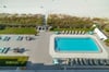 'Flip Flops & Sunsets' overlooks the Mariner West pool