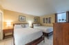 Second guest bedroom offer two queen-sized