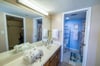 Coastal Seas Master Bath features a single vanity and walk-in shower