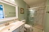 Your Palms Oasis Main Bathroom has a beautiful walk in shower with glass doors.