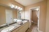 Your private en-suite main bathroom has high end cabinetry and granite counter tops. There's a huge soaking tub, too.