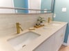 Fully renovated master bath with double vanities