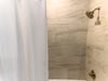 Walk-in shower with elegant tile